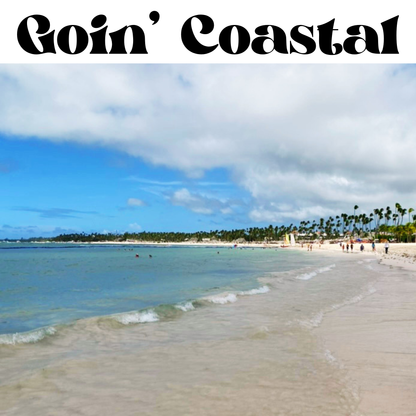 A tropical beach scene with pale sand, turquoise water, palm trees, and a partly cloudy blue sky. Large black text at the top reads 'Goin' Coastal'.
