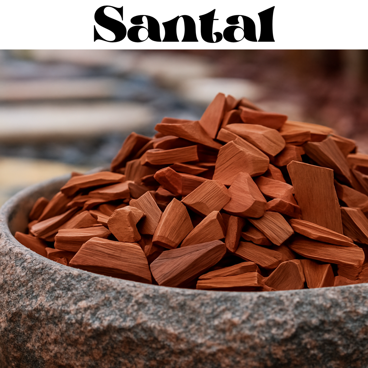 A close-up of a stone bowl filled with shredded reddish-brown wood pieces, with the word 'Santal' in large black text across the top.