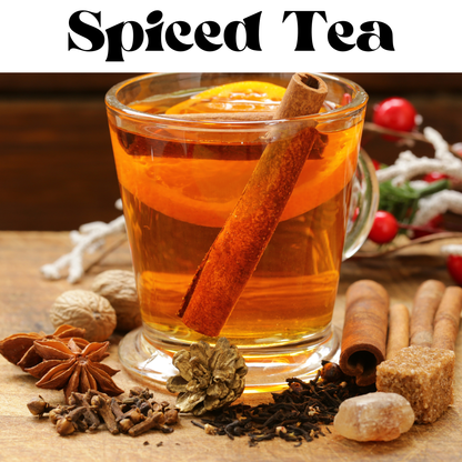A clear glass mug filled with amber spiced tea, garnished with a cinnamon stick and orange slice, surrounded by tea ingredients including star anise, cloves, cinnamon sticks, brown sugar, and loose tea leaves on a wooden surface. The text 'Spiced Tea' appears at the top.